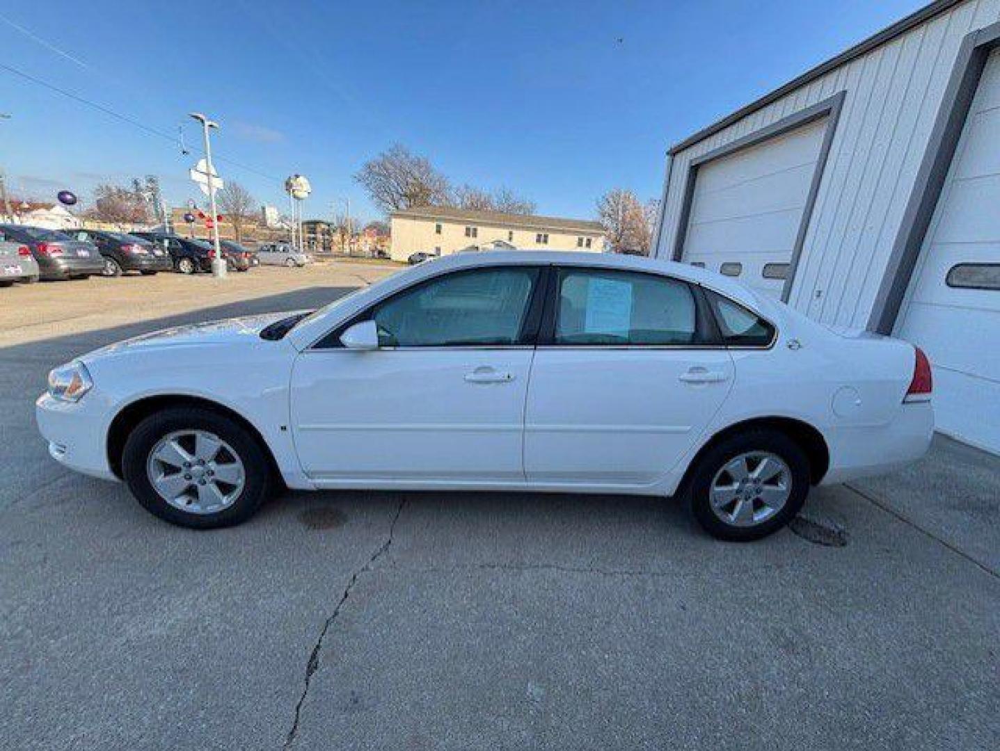 2007 WHITE CHEVROLET IMPALA LT (2G1WT55N379) with an 3.5L engine, Automatic transmission, located at 1100 W. Sheridan Ave., Shenandoah, 51601, (712) 246-1600, 40.765678, -95.388817 - Photo#1