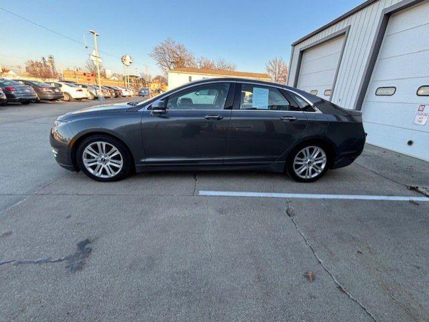 2016 GRAY LINCOLN MKZ (3LN6L2G91GR) with an 2.0L engine, Automatic transmission, located at 1100 W. Sheridan Ave., Shenandoah, 51601, (712) 246-1600, 40.765678, -95.388817 - Photo#1