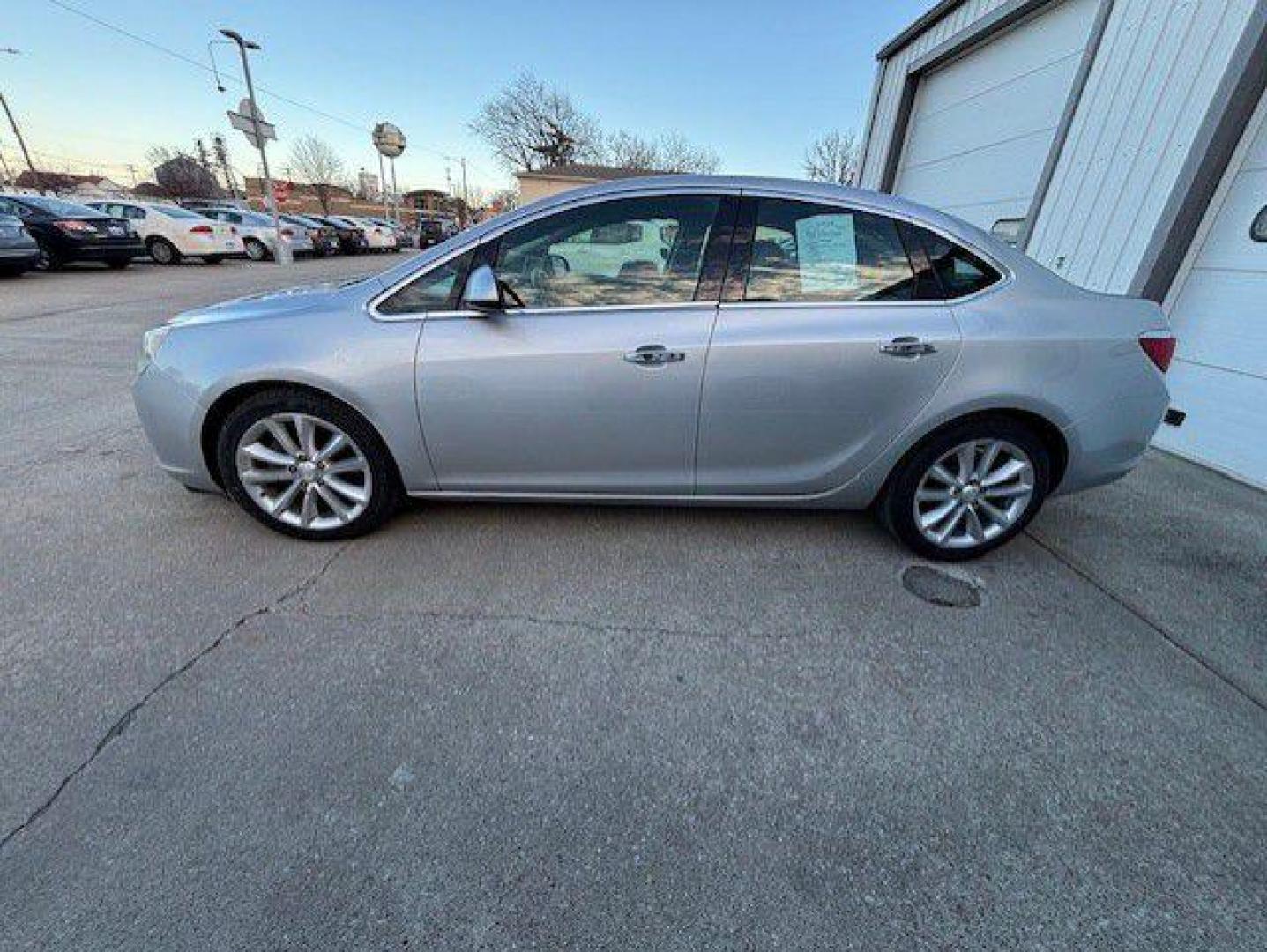 2015 SILVER BUICK VERANO (1G4PS5SK7F4) with an 2.4L engine, Automatic transmission, located at 1100 W. Sheridan Ave., Shenandoah, 51601, (712) 246-1600, 40.765678, -95.388817 - Photo#1