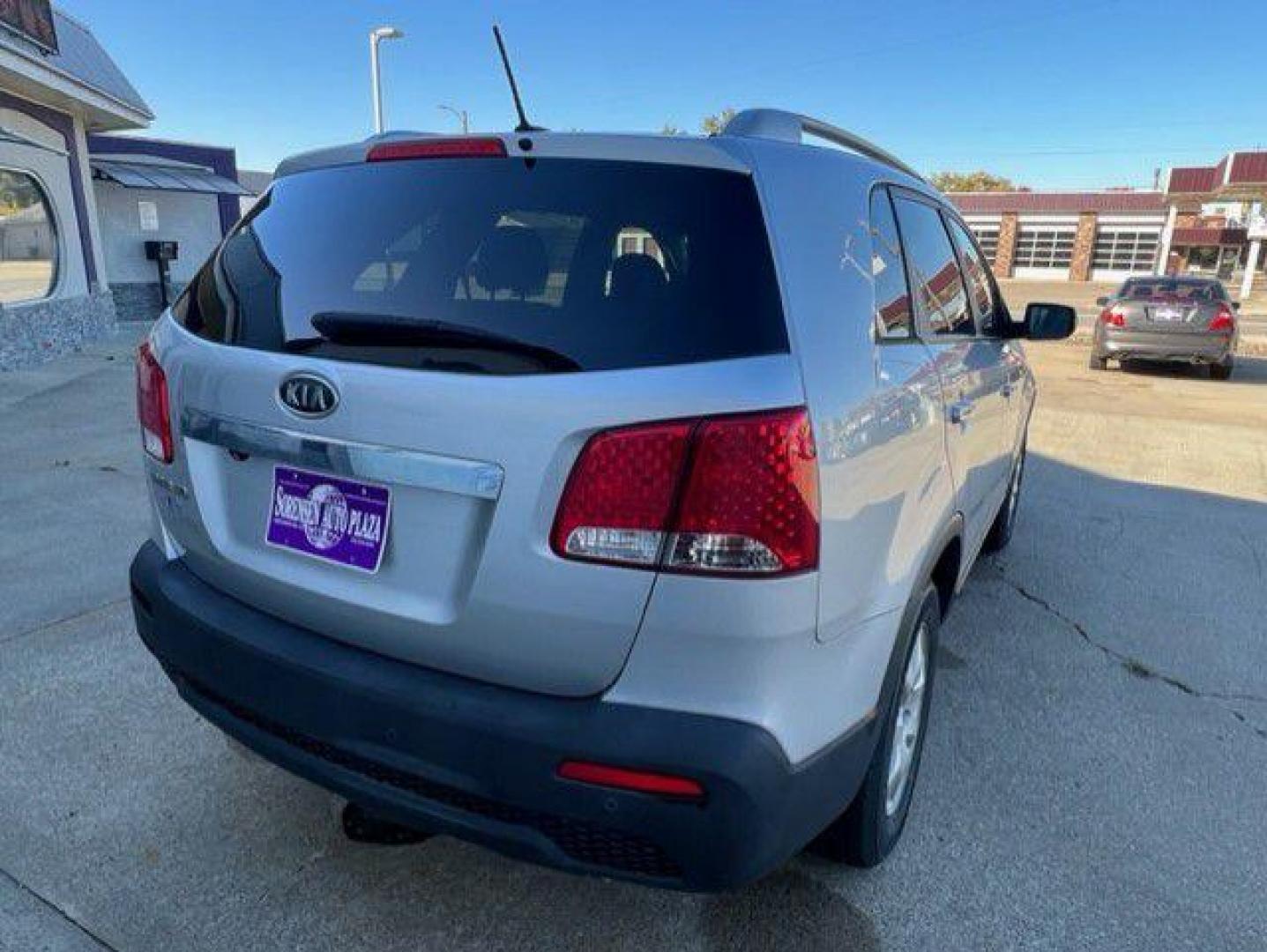 2012 SILVER KIA SORENTO BASE (5XYKT3A69CG) with an 2.4L engine, Automatic transmission, located at 1100 W. Sheridan Ave., Shenandoah, 51601, (712) 246-1600, 40.765678, -95.388817 - Photo#1