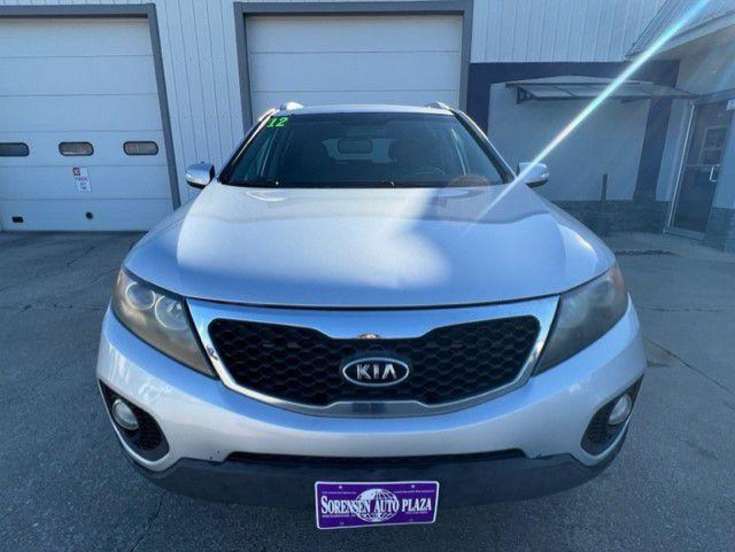 2012 SILVER KIA SORENTO BASE (5XYKT3A69CG) with an 2.4L engine, Automatic transmission, located at 1100 W. Sheridan Ave., Shenandoah, 51601, (712) 246-1600, 40.765678, -95.388817 - Photo#6