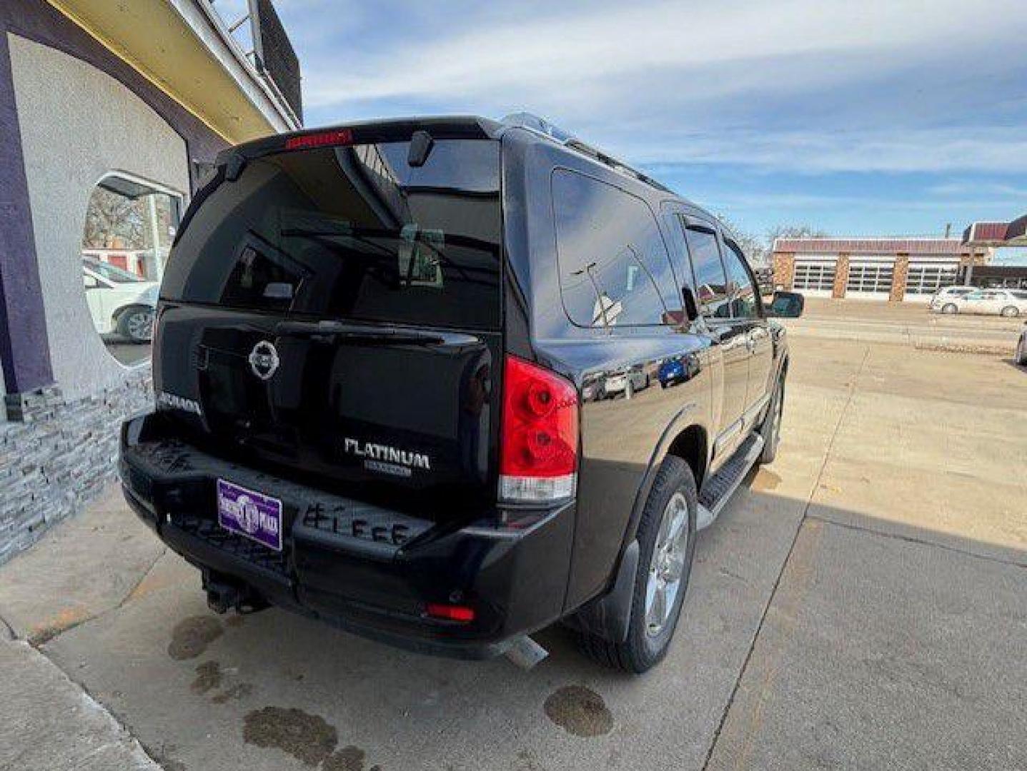 2012 BLACK NISSAN ARMADA SV (5N1BA0NE5CN) with an 5.6L engine, Automatic transmission, located at 1100 W. Sheridan Ave., Shenandoah, 51601, (712) 246-1600, 40.765678, -95.388817 - Photo#1