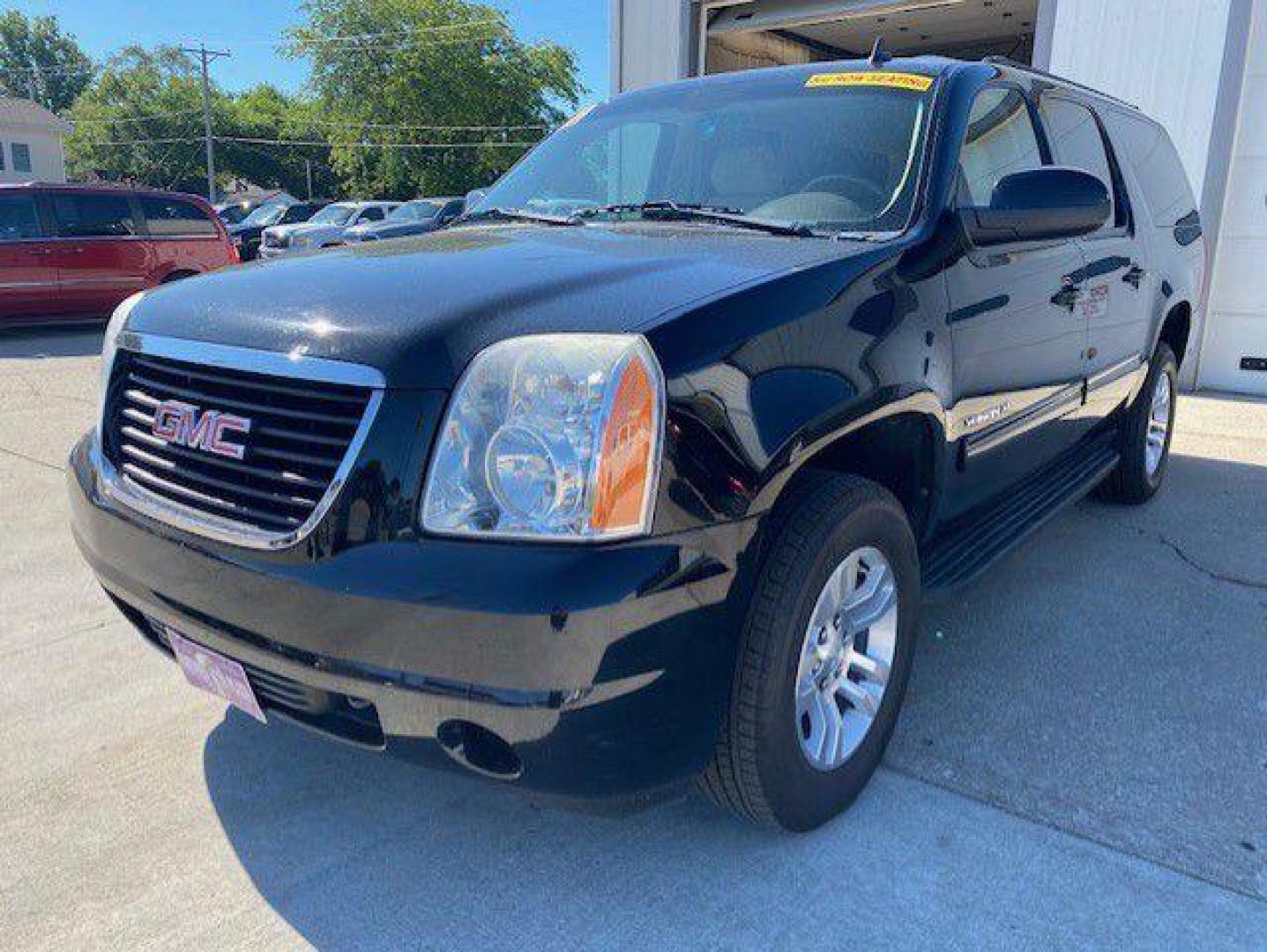 2011 BLACK GMC YUKON XL 1500 SLE (1GKS2HE39BR) with an 5.3L engine, Automatic transmission, located at 1100 W. Sheridan Ave., Shenandoah, 51601, (712) 246-1600, 40.765678, -95.388817 - Photo#0