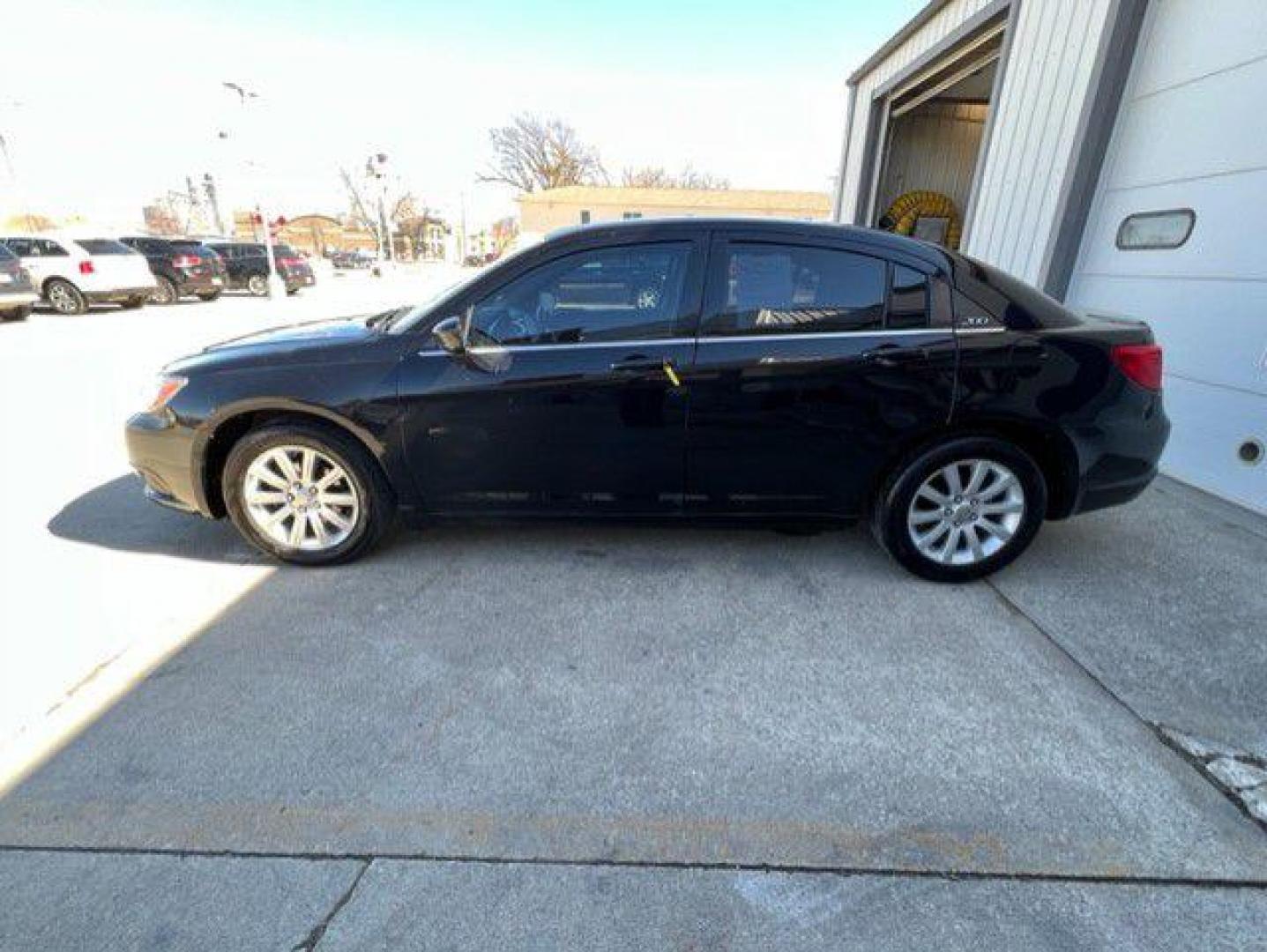 2012 BLACK CHRYSLER 200 TOURING (1C3CCBBBXCN) with an 2.4L engine, Automatic transmission, located at 1100 W. Sheridan Ave., Shenandoah, 51601, (712) 246-1600, 40.765678, -95.388817 - Photo#2