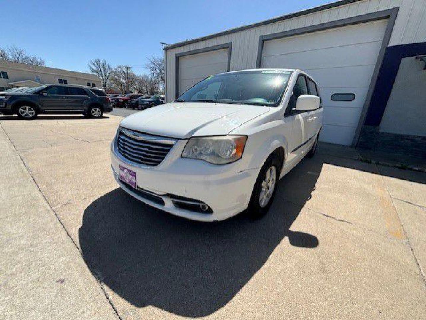 2012 WHITE CHRYSLER TOWN and COUNTRY TOURING (2C4RC1BG3CR) with an 3.6L engine, Automatic transmission, located at 1100 W. Sheridan Ave., Shenandoah, 51601, (712) 246-1600, 40.765678, -95.388817 - Photo#0