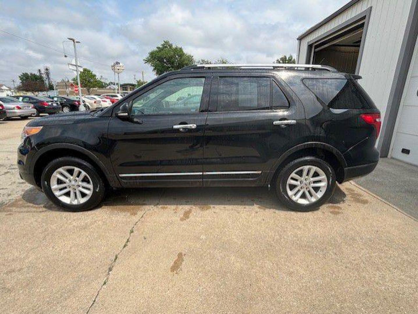 2013 BLACK FORD EXPLORER XLT (1FM5K8D80DG) with an 3.5L engine, Automatic transmission, located at 1100 W. Sheridan Ave., Shenandoah, 51601, (712) 246-1600, 40.765678, -95.388817 - Photo#1