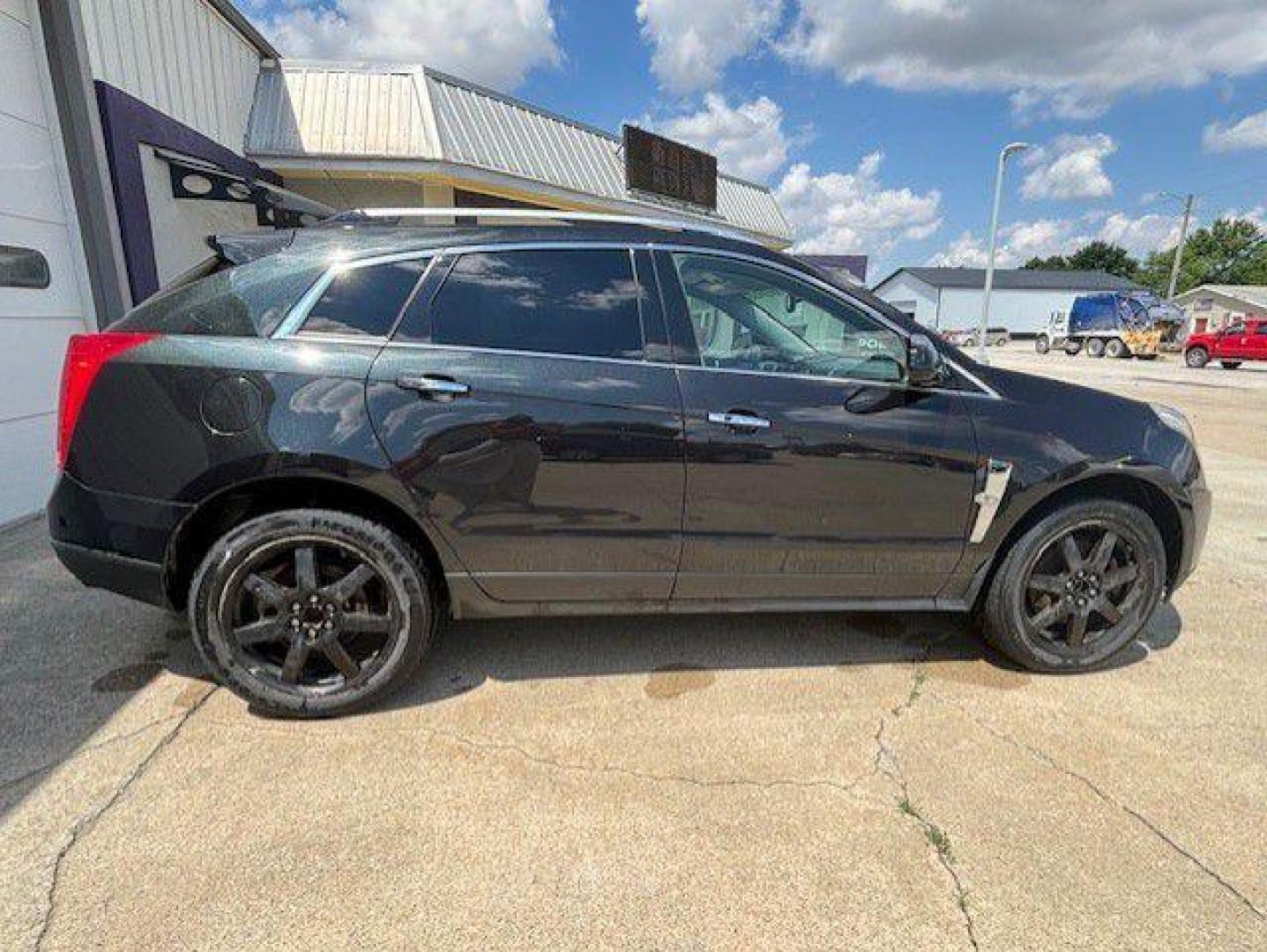 2011 BLACK CADILLAC SRX PERFORMANCE COLLECTION (3GYFNJE62BS) with an 2.8L engine, Automatic transmission, located at 1100 W. Sheridan Ave., Shenandoah, 51601, (712) 246-1600, 40.765678, -95.388817 - Photo#3