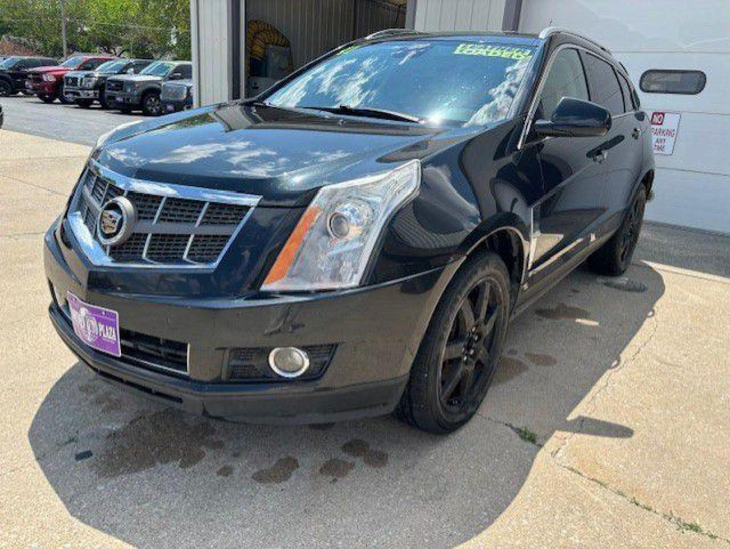 2011 BLACK CADILLAC SRX PERFORMANCE COLLECTION (3GYFNJE62BS) with an 2.8L engine, Automatic transmission, located at 1100 W. Sheridan Ave., Shenandoah, 51601, (712) 246-1600, 40.765678, -95.388817 - Photo#0