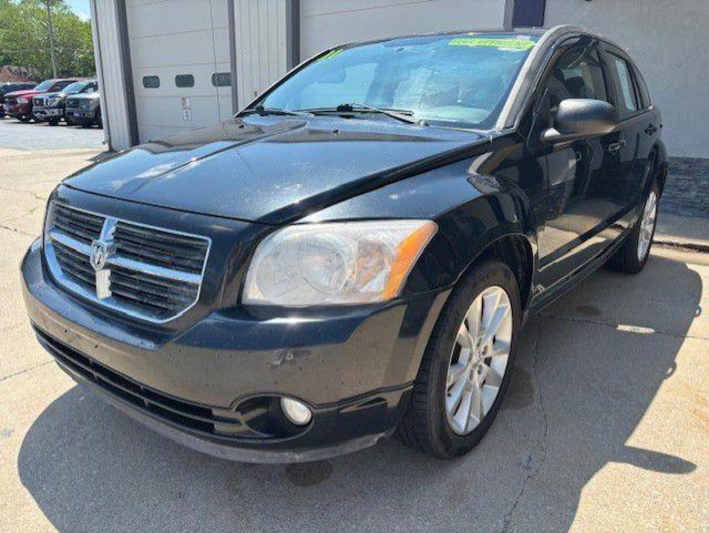 2011 BLACK DODGE CALIBER HEAT (1B3CB5HA8BD) with an 2.0L engine, Automatic transmission, located at 1100 W. Sheridan Ave., Shenandoah, 51601, (712) 246-1600, 40.765678, -95.388817 - Photo#0