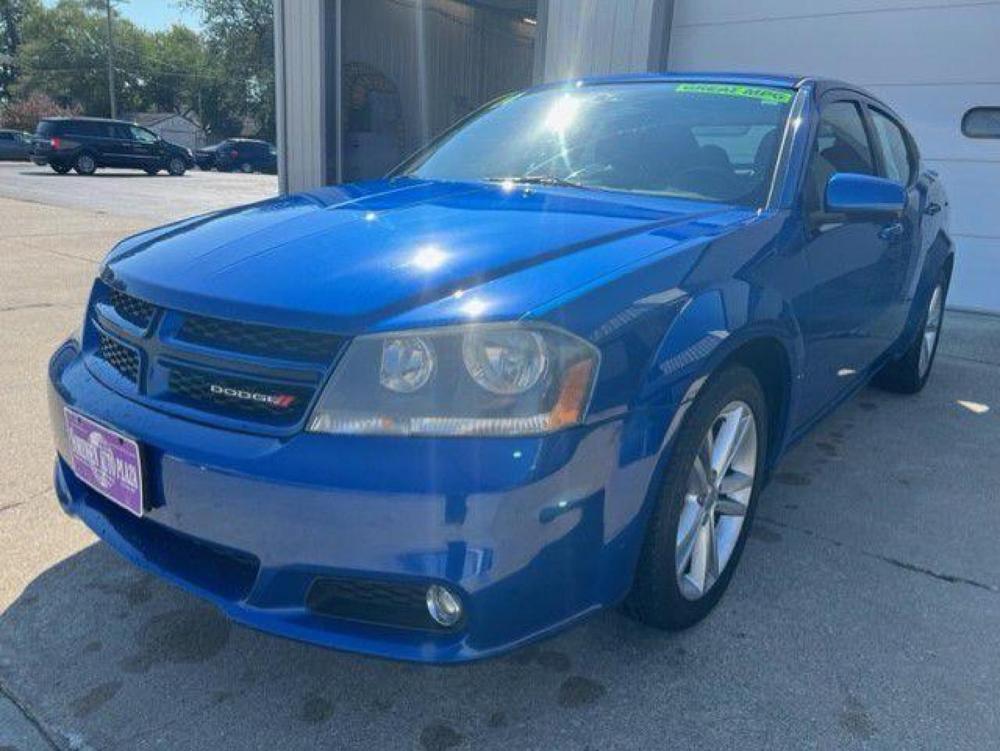 2014 BLUE DODGE AVENGER SXT (1C3CDZCB0EN) with an 2.4L engine, Automatic transmission, located at 1100 W. Sheridan Ave., Shenandoah, 51601, (712) 246-1600, 40.765678, -95.388817 - Photo#0