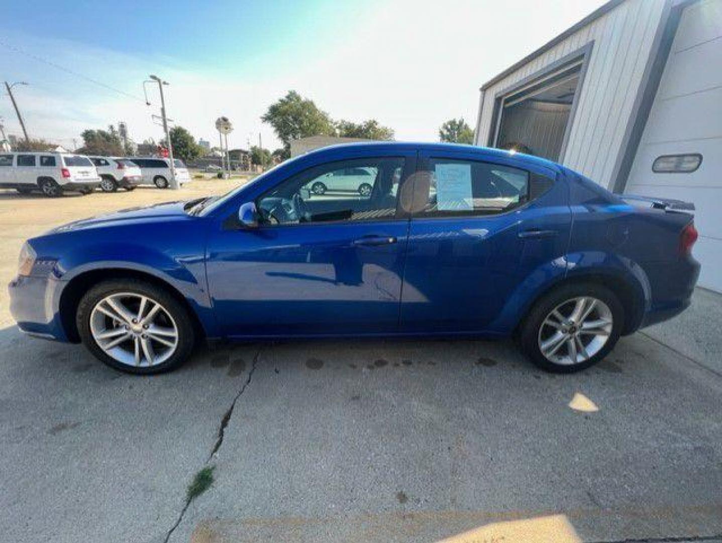 2014 BLUE DODGE AVENGER SXT (1C3CDZCB0EN) with an 2.4L engine, Automatic transmission, located at 1100 W. Sheridan Ave., Shenandoah, 51601, (712) 246-1600, 40.765678, -95.388817 - Photo#2