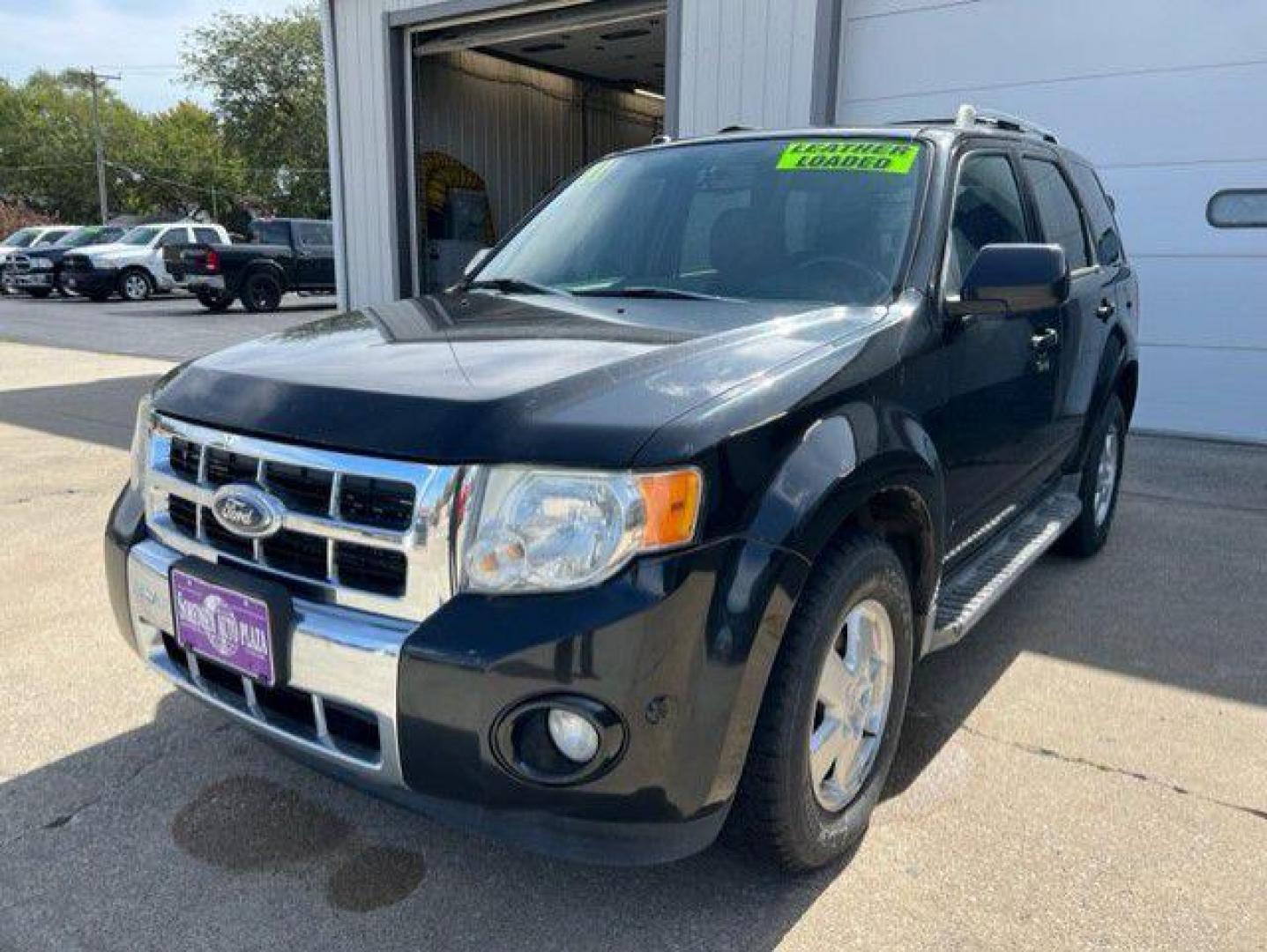 2011 BLACK FORD ESCAPE LIMITED (1FMCU9EG5BK) with an 3.0L engine, Automatic transmission, located at 1100 W. Sheridan Ave., Shenandoah, 51601, (712) 246-1600, 40.765678, -95.388817 - Photo#0