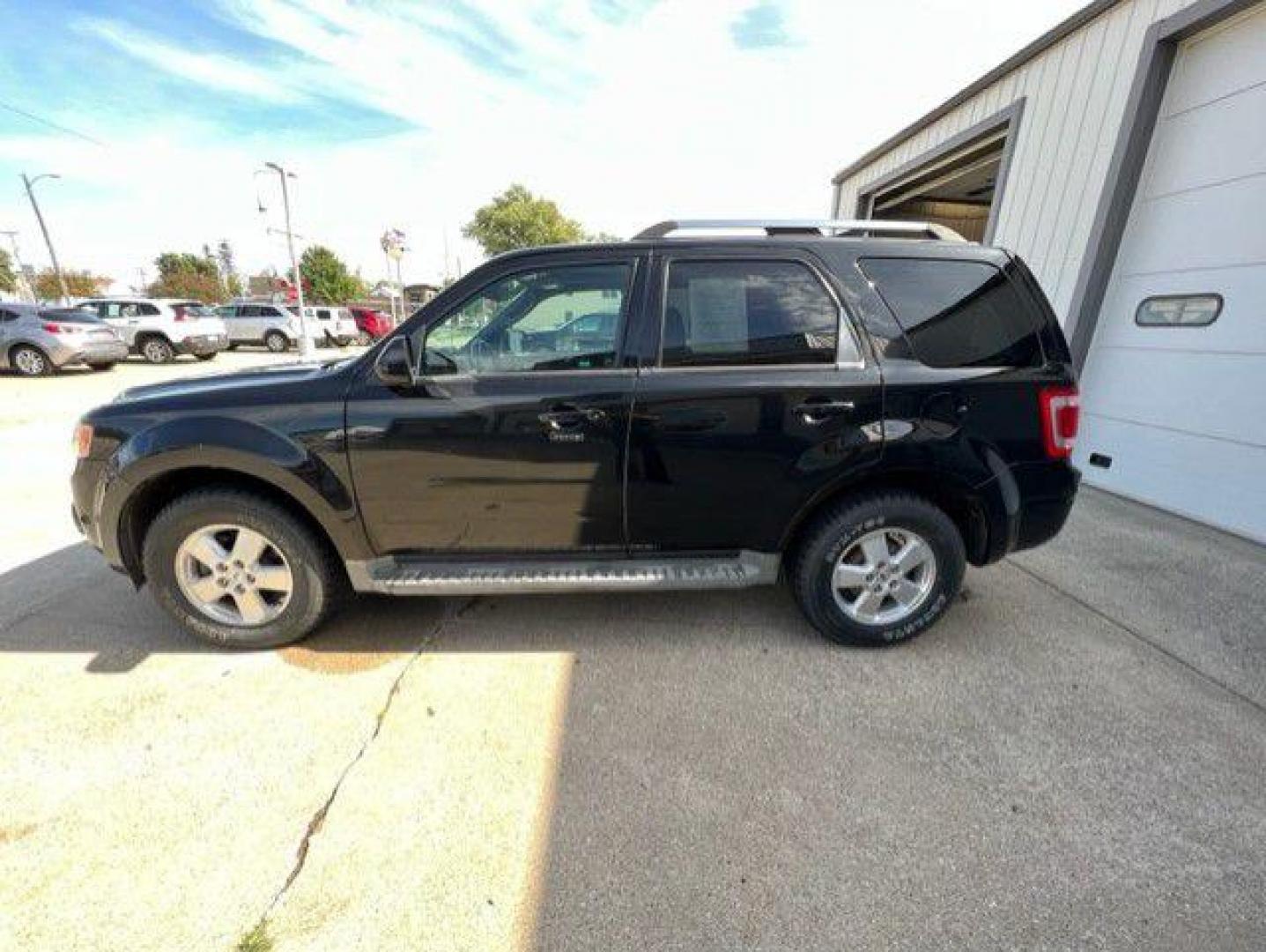 2011 BLACK FORD ESCAPE LIMITED (1FMCU9EG5BK) with an 3.0L engine, Automatic transmission, located at 1100 W. Sheridan Ave., Shenandoah, 51601, (712) 246-1600, 40.765678, -95.388817 - Photo#2