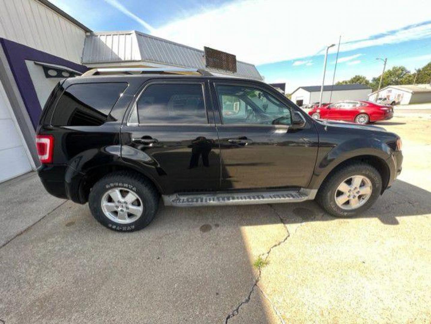 2011 BLACK FORD ESCAPE LIMITED (1FMCU9EG5BK) with an 3.0L engine, Automatic transmission, located at 1100 W. Sheridan Ave., Shenandoah, 51601, (712) 246-1600, 40.765678, -95.388817 - Photo#6