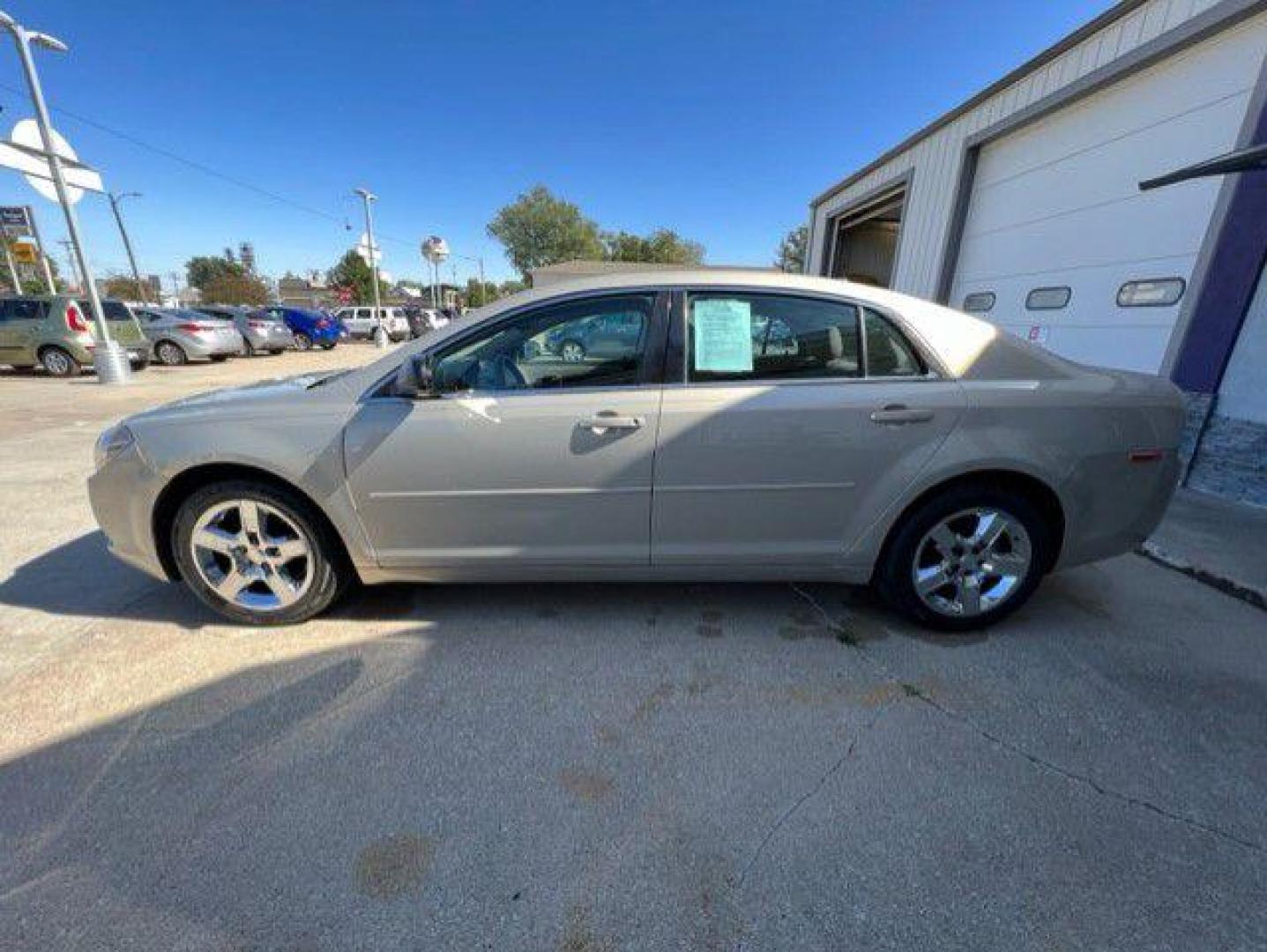 2012 BEIGE CHEVROLET MALIBU LS (1G1ZB5E0XCF) with an 2.4L engine, Automatic transmission, located at 1100 W. Sheridan Ave., Shenandoah, 51601, (712) 246-1600, 40.765678, -95.388817 - Photo#2