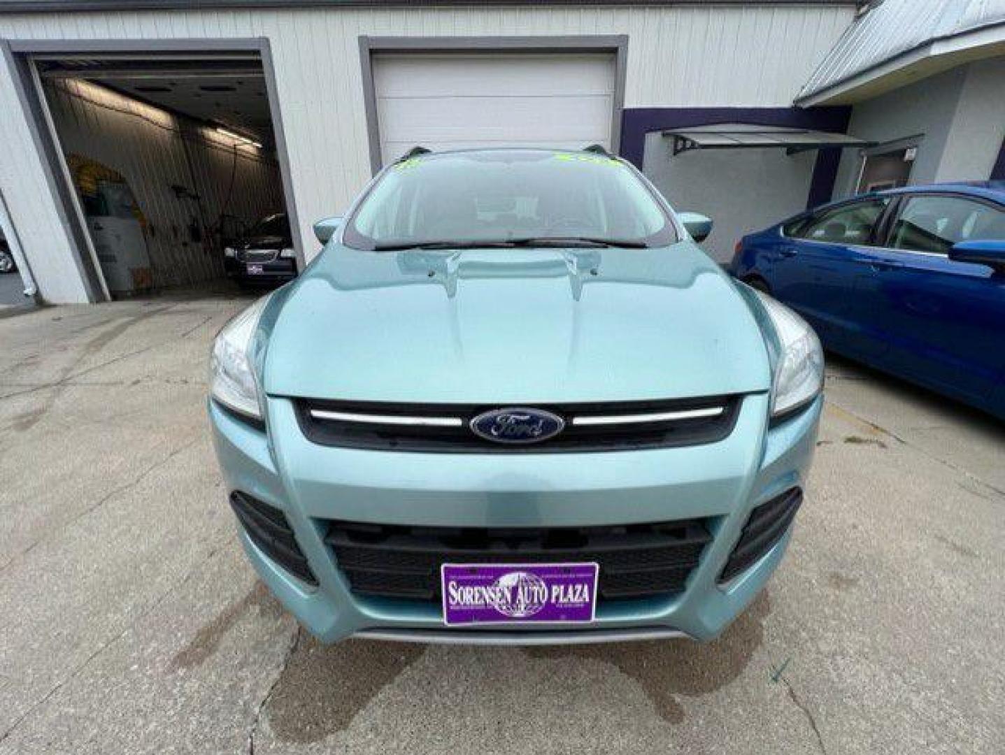 2013 GREEN FORD ESCAPE SE (1FMCU9GX7DU) with an 1.6L engine, Automatic transmission, located at 1100 W. Sheridan Ave., Shenandoah, 51601, (712) 246-1600, 40.765678, -95.388817 - Photo#7