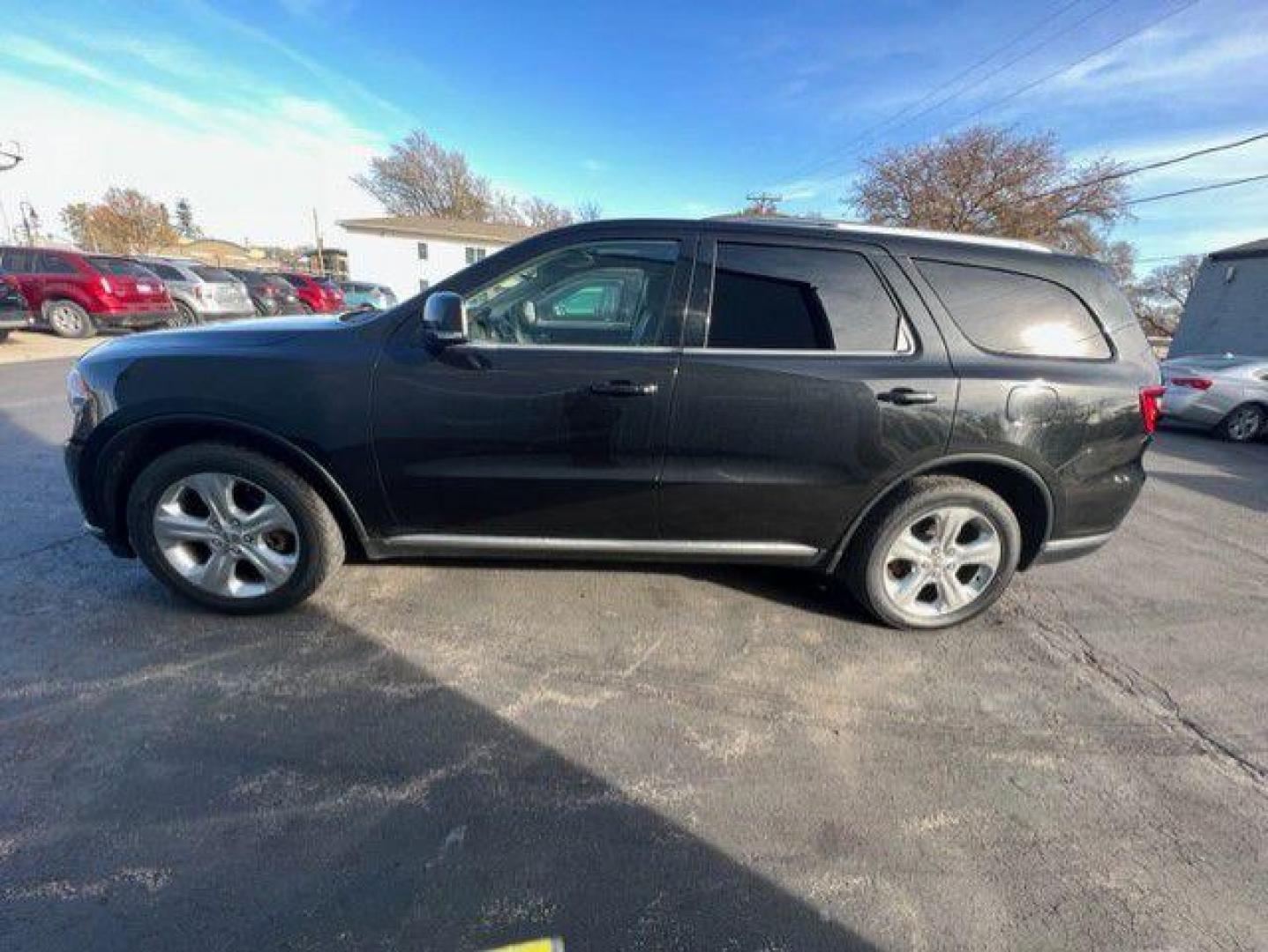 2014 BLACK DODGE DURANGO LIMITED (1C4SDJDT3EC) with an 5.7L engine, Automatic transmission, located at 1100 W. Sheridan Ave., Shenandoah, 51601, (712) 246-1600, 40.765678, -95.388817 - Photo#1