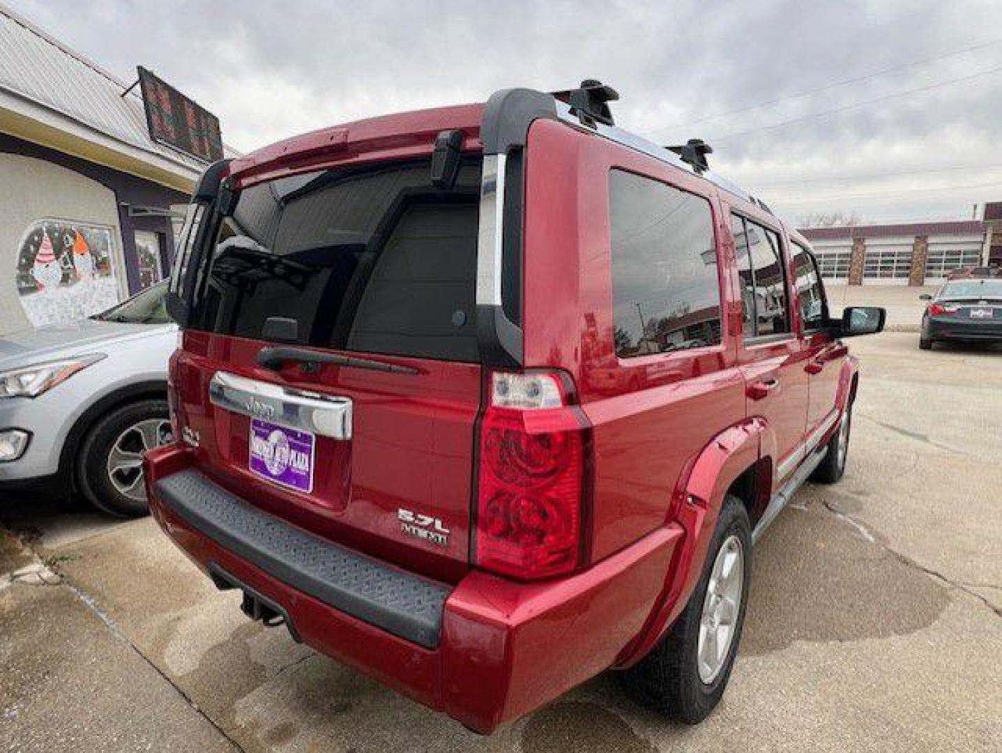 2006 MAROON JEEP COMMANDER LIMITED (1J8HG58286C) with an 5.7L engine, Automatic transmission, located at 1100 W. Sheridan Ave., Shenandoah, 51601, (712) 246-1600, 40.765678, -95.388817 - Photo#1