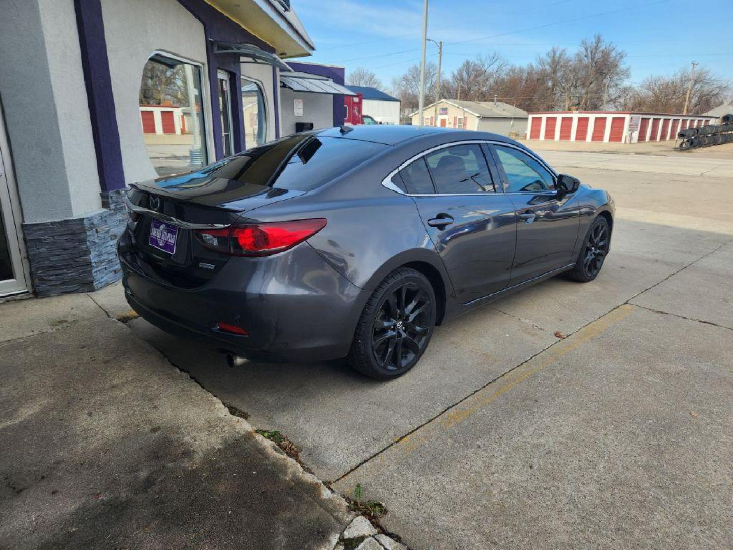 2015 GRAY MAZDA 6 GRAND TOURING (JM1GJ1W68F1) with an 2.5L engine, Automatic transmission, located at 1100 W. Sheridan Ave., Shenandoah, 51601, (712) 246-1600, 40.765678, -95.388817 - Photo#1