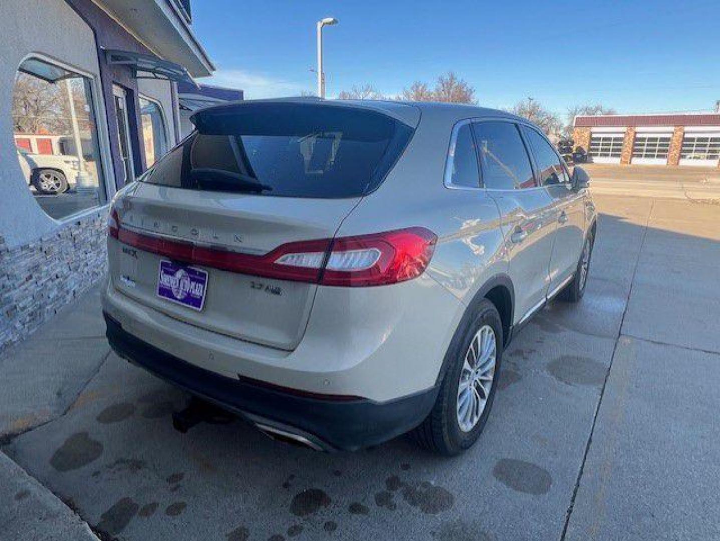 2016 BEIGE LINCOLN MKX SELECT (2LMTJ8KP6GB) with an 2.7L engine, Automatic transmission, located at 1100 W. Sheridan Ave., Shenandoah, 51601, (712) 246-1600, 40.765678, -95.388817 - Photo#1