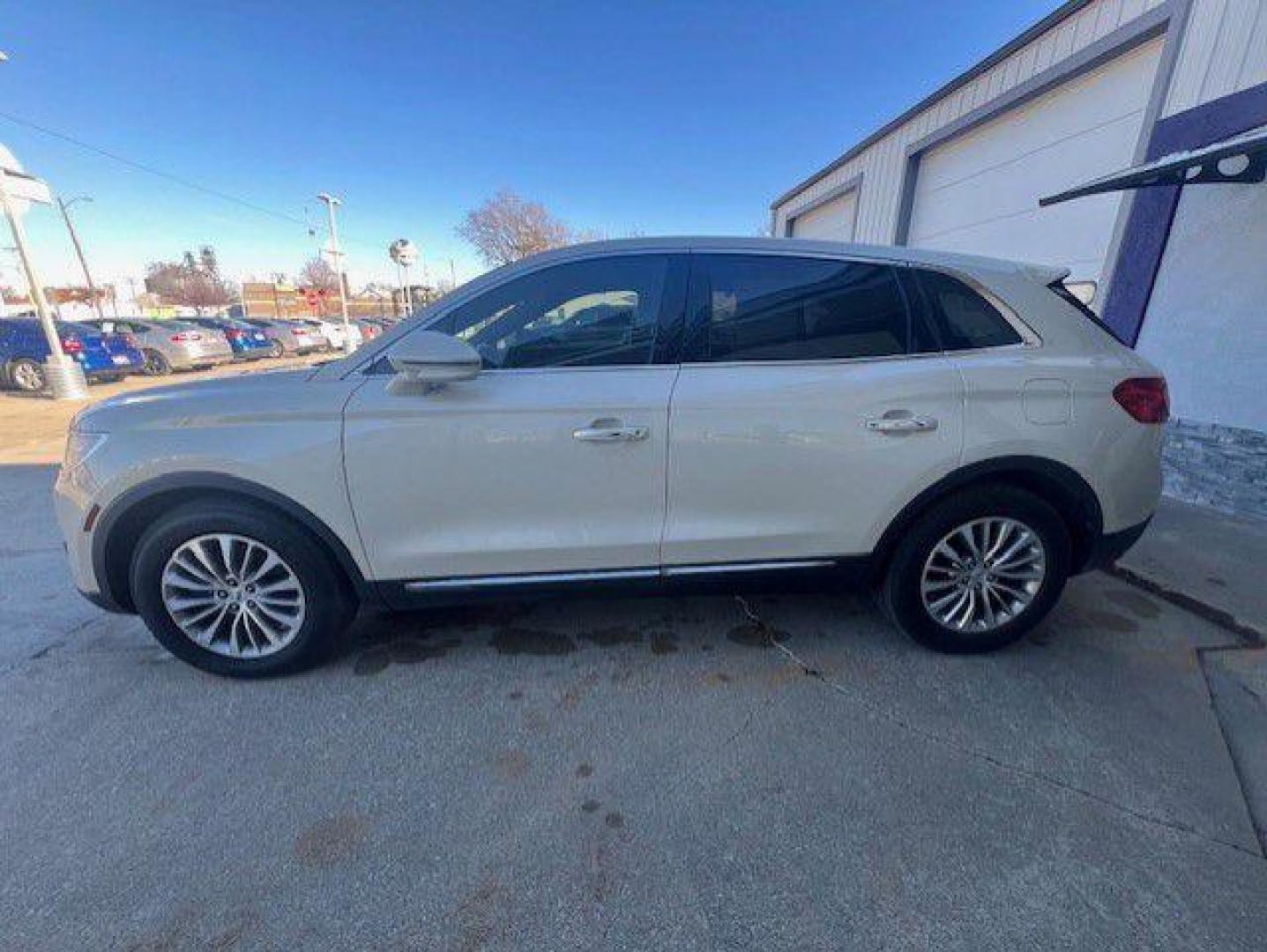 2016 BEIGE LINCOLN MKX SELECT (2LMTJ8KP6GB) with an 2.7L engine, Automatic transmission, located at 1100 W. Sheridan Ave., Shenandoah, 51601, (712) 246-1600, 40.765678, -95.388817 - Photo#2