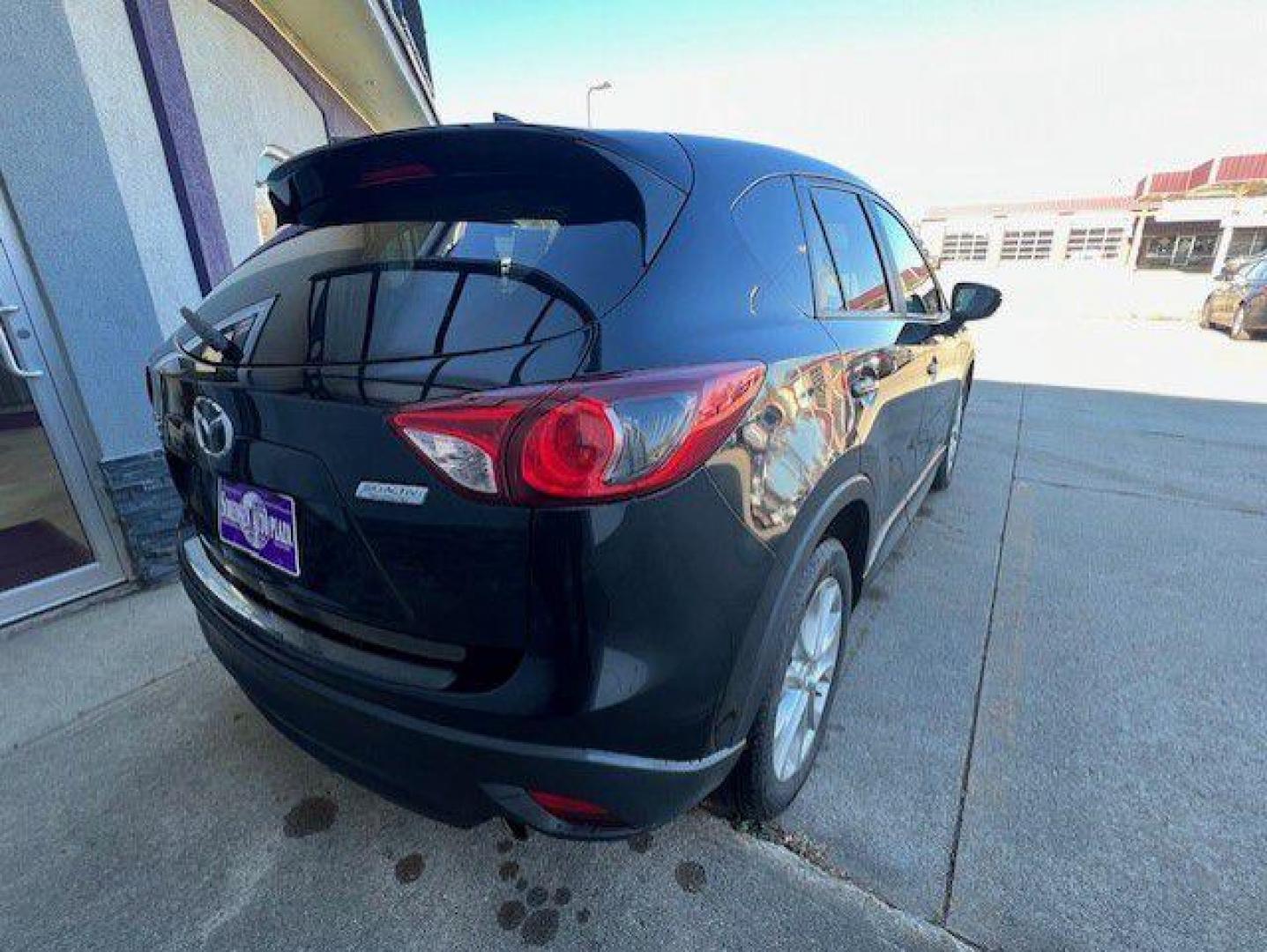 2015 BLACK MAZDA CX-5 GRAND TOURING (JM3KE4DY9F0) with an 2.5L engine, Automatic transmission, located at 1100 W. Sheridan Ave., Shenandoah, 51601, (712) 246-1600, 40.765678, -95.388817 - Photo#1